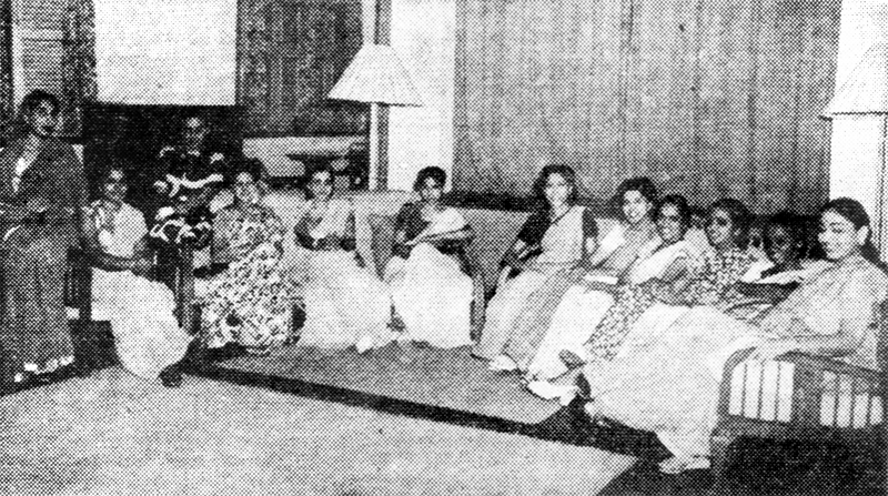 Committee members of the Lotus Club discussing a fundraising gala for the University of Malaya Fund, 1949. Image reproduced from the Straits Times, 27 July 1949, 7. (From NewspaperSG).